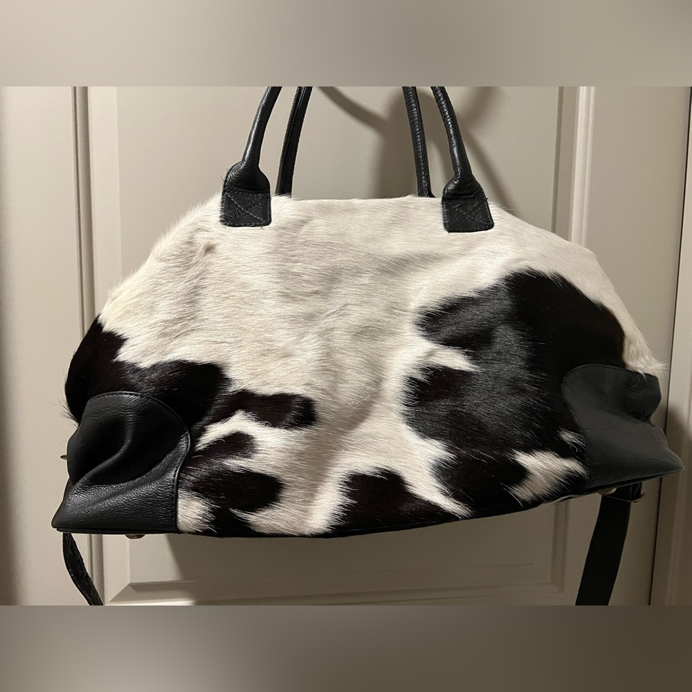 Cowhide duffle bag